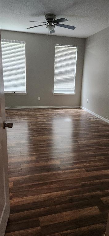 8180 Boat Hook Loop, Unit 310 Windermere, FL 34786 - Photo 9 of 11 a view of room with window and wooden floor