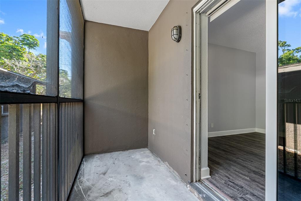 263 14th Street Northwest, Unit 3A Largo, FL 33770 - Photo 10 of 11 a view of hallway with wooden floor
