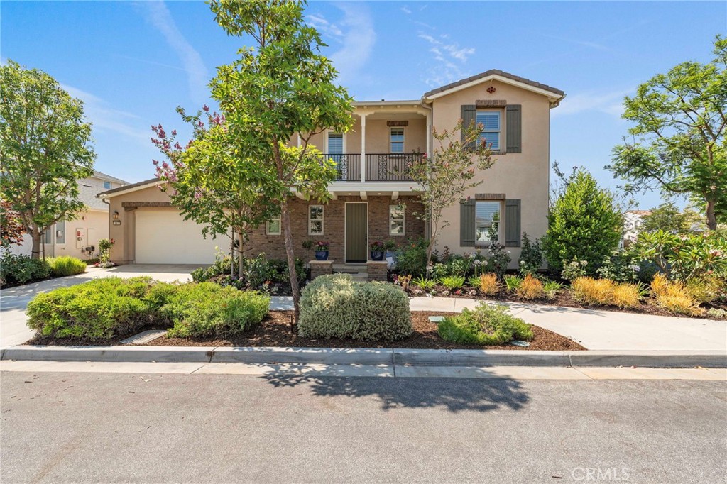 107 Rake Irvine, CA 92618 - Photo 1 of 1 front view of a house with a yard