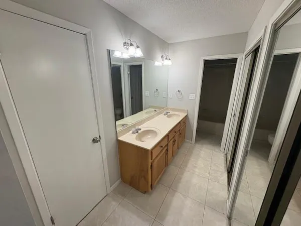 a utility room with cabinets