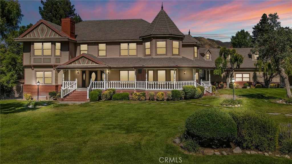 26678 MacMillan Ranch Road Canyon Country, CA 91387 - Photo 1 of 1 a front view of a house with a yard