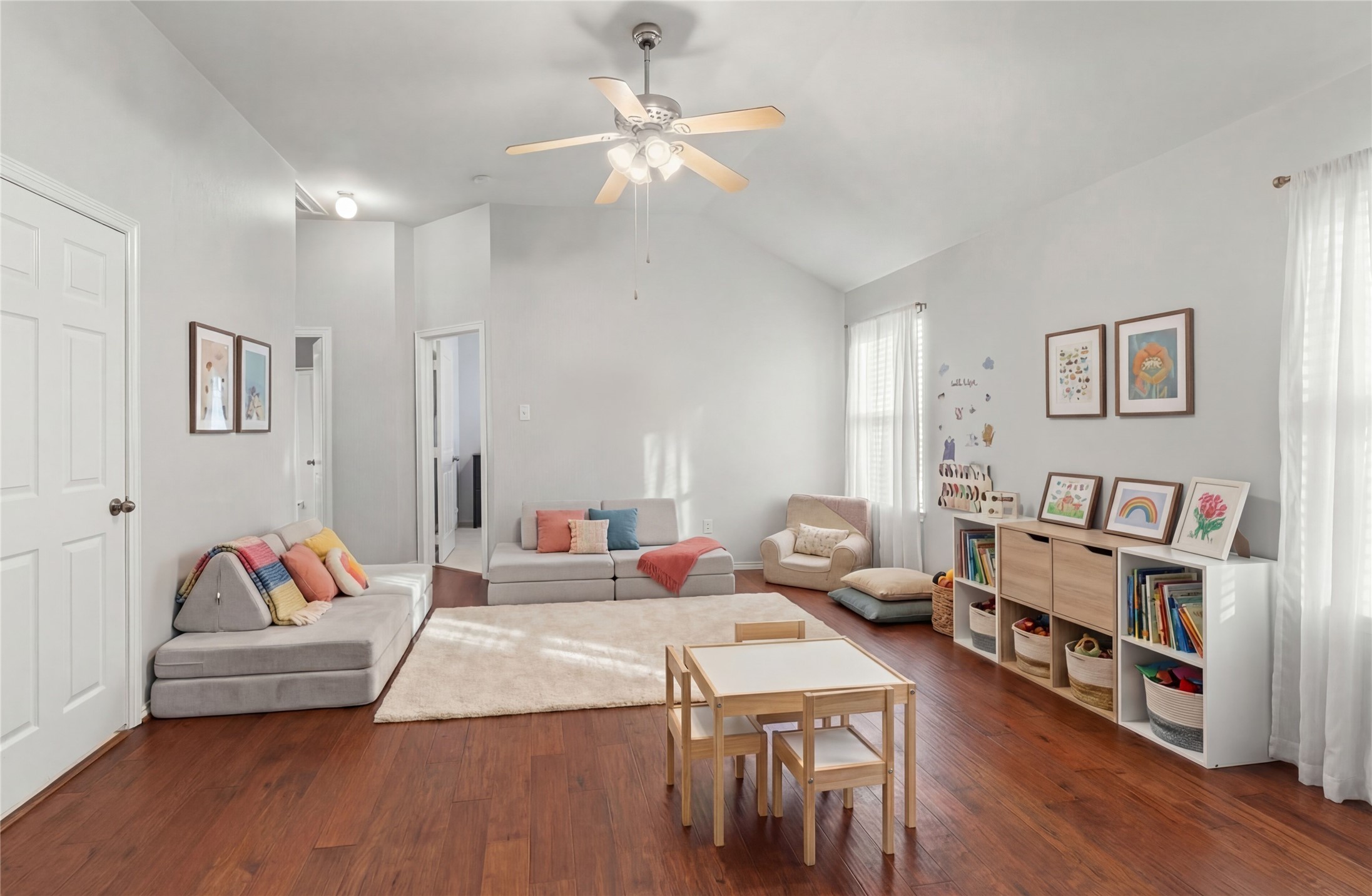 2217 Valley View Crossing Conroe, TX 77304 - Photo 17 of 24 a living room with furniture and wooden floor