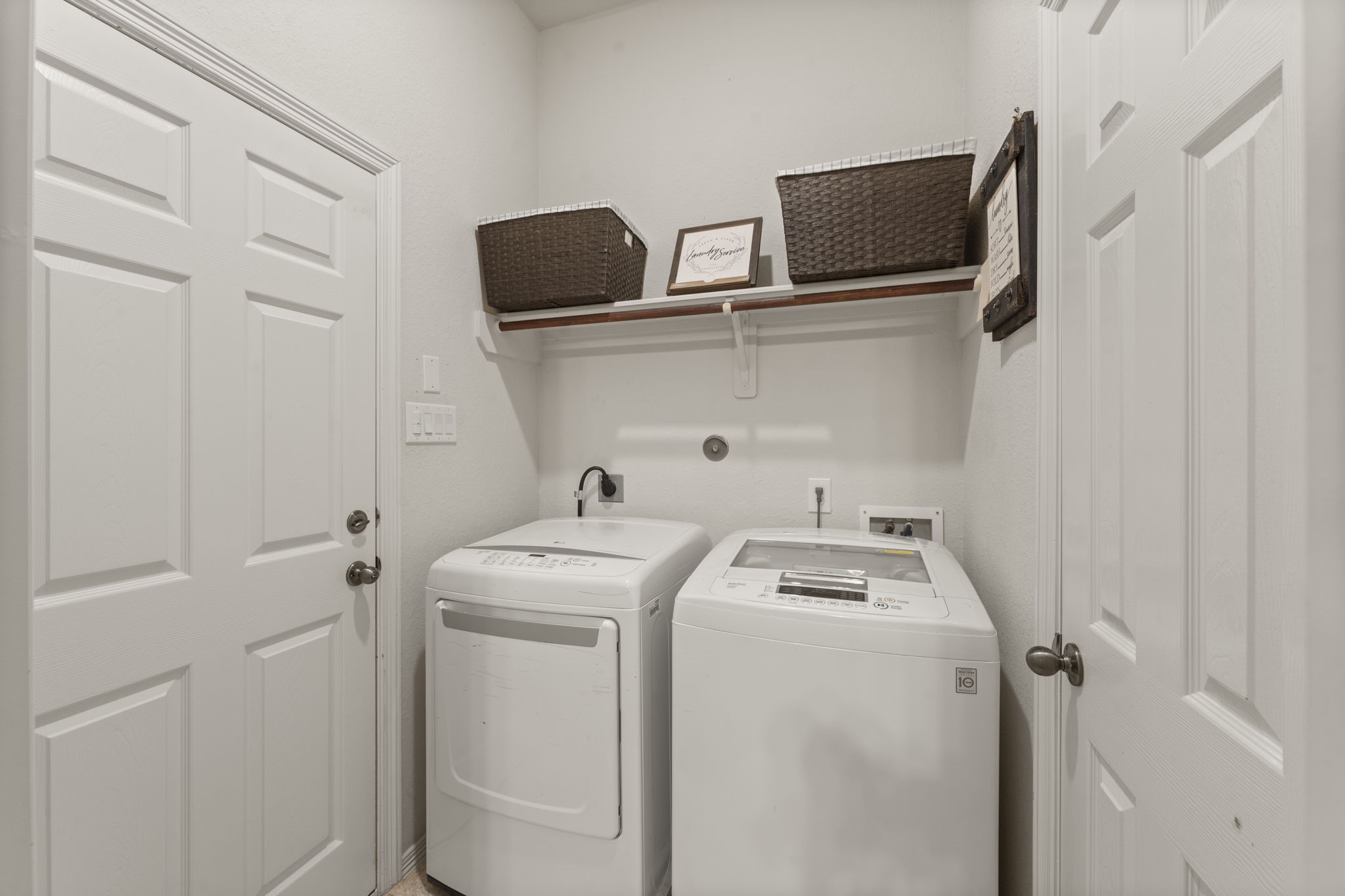 2217 Valley View Crossing Conroe, TX 77304 - Photo 18 of 24 a utility room with dryer and washer