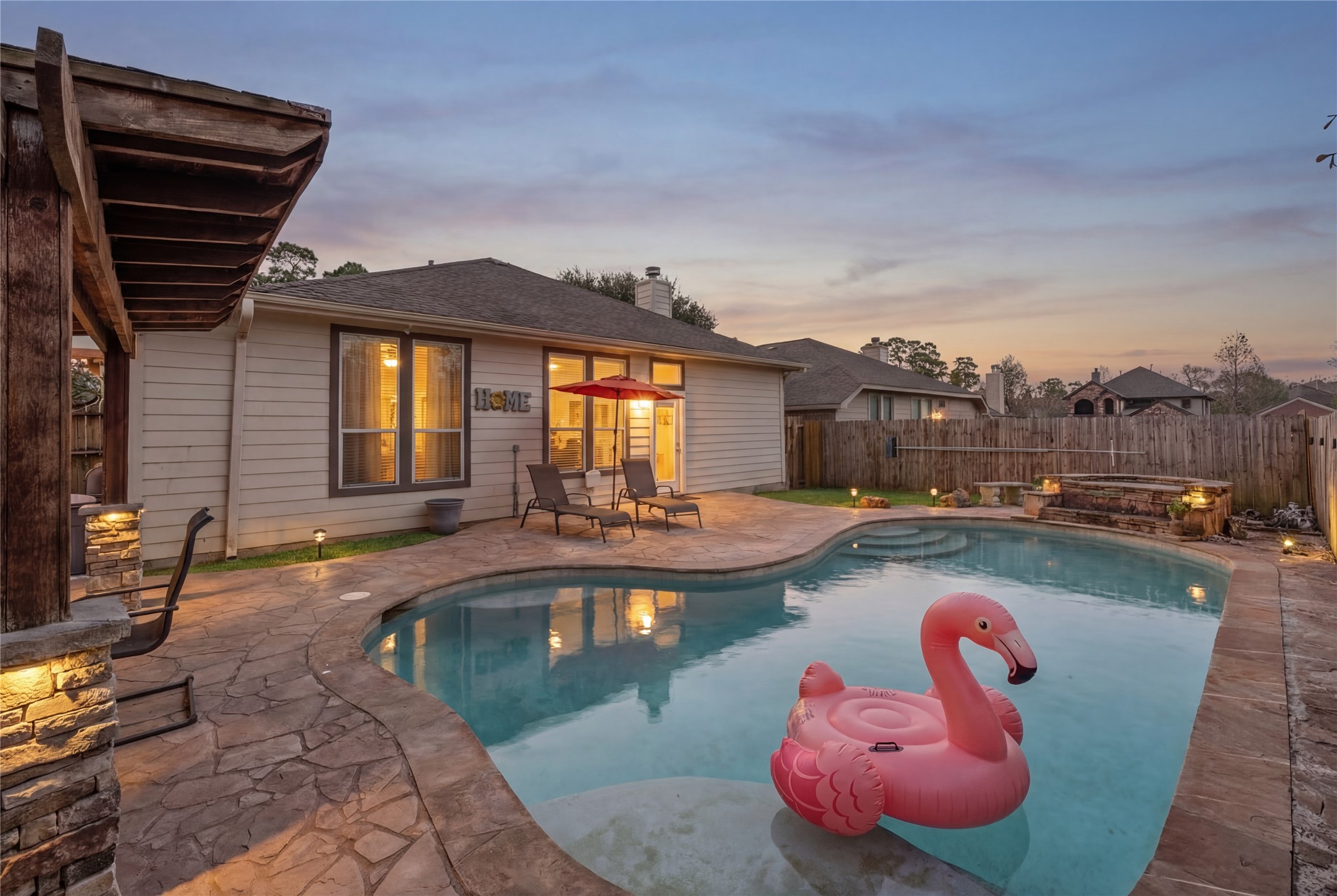 2217 Valley View Crossing Conroe, TX 77304 - Photo 2 of 24 a view of a swimming pool with lounge chairs