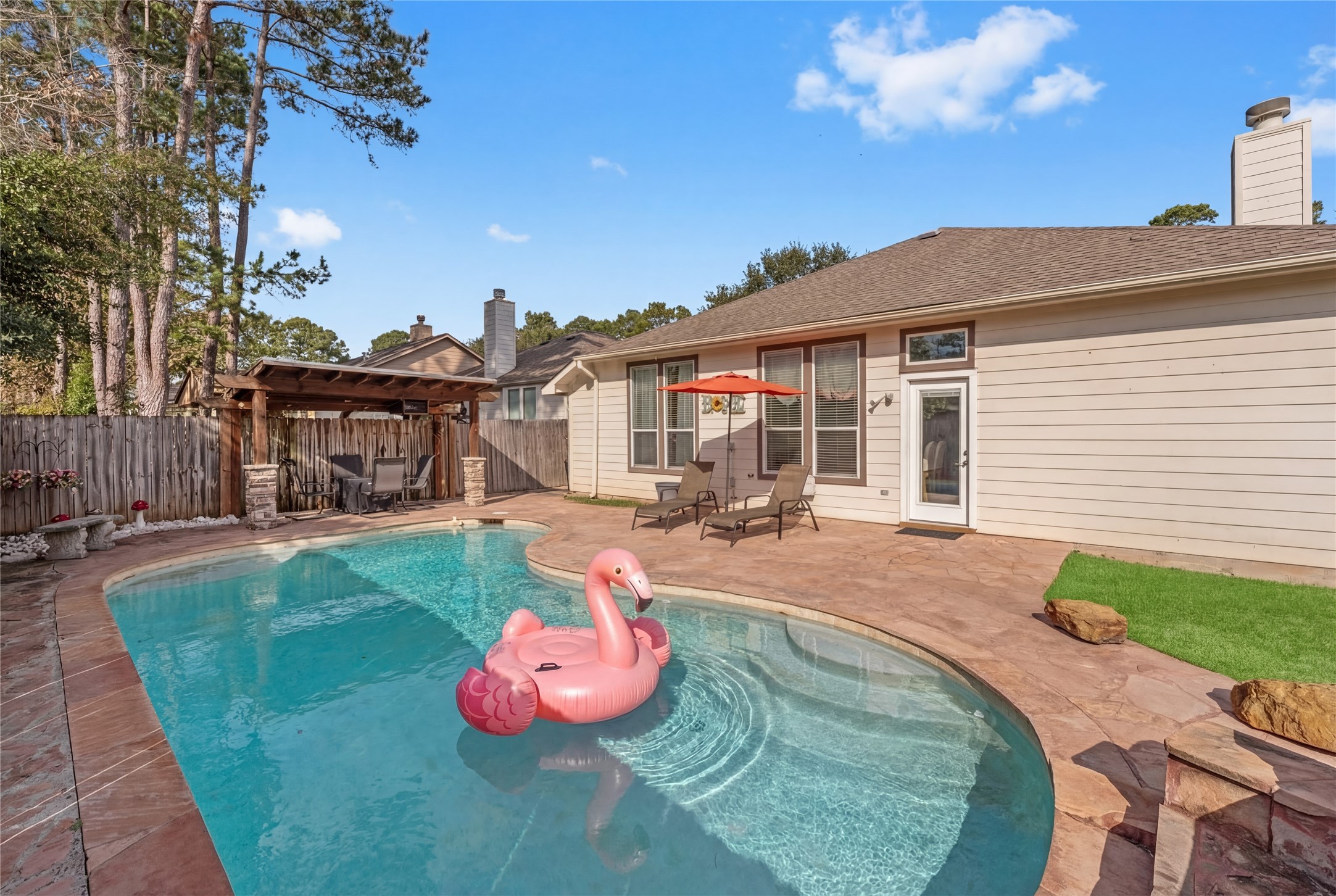 2217 Valley View Crossing Conroe, TX 77304 - Photo 21 of 24 a view of a house with backyard