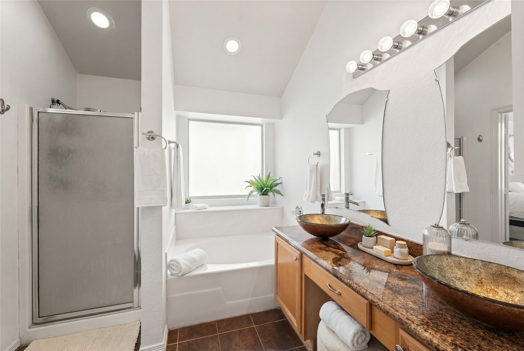 2217 Valley View Crossing Conroe, TX 77304 - Photo 5 of 24 a bathroom with a granite countertop sink and a mirror