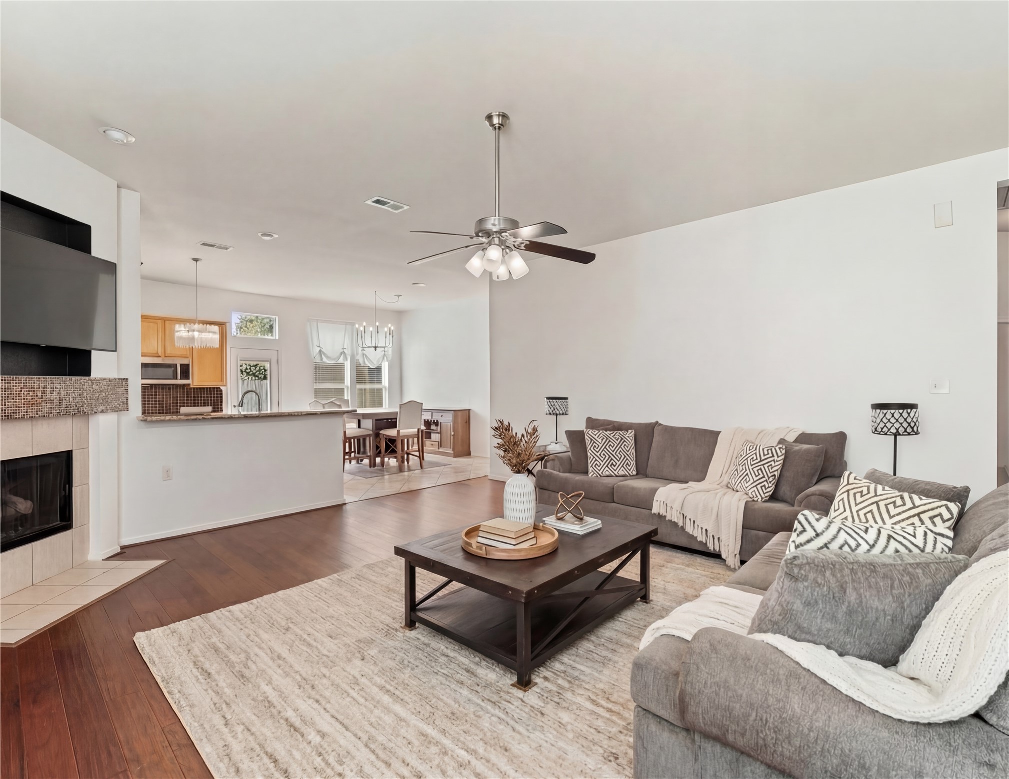 2217 Valley View Crossing Conroe, TX 77304 - Photo 7 of 24 a living room with furniture and a fireplace