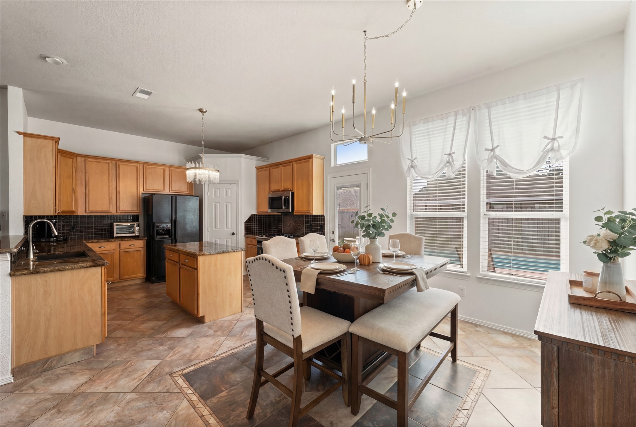 2217 Valley View Crossing Conroe, TX 77304 - Photo 9 of 24 a dining room with furniture and window