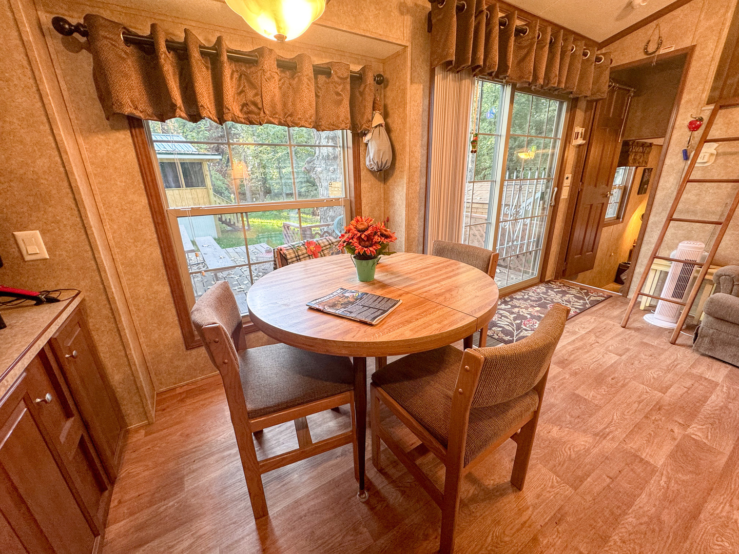 15-185 Woodhaven Sublette, IL 61367 - Photo 13 of 22 a view of a dining room with furniture window and wooden floor