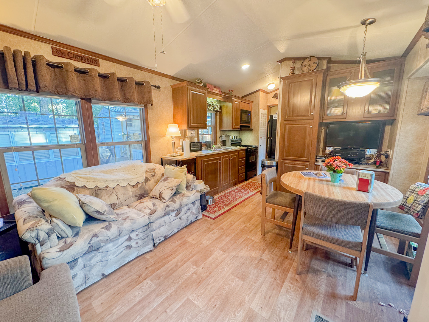 15-185 Woodhaven Sublette, IL 61367 - Photo 15 of 22 a bedroom with a bed and a chandelier