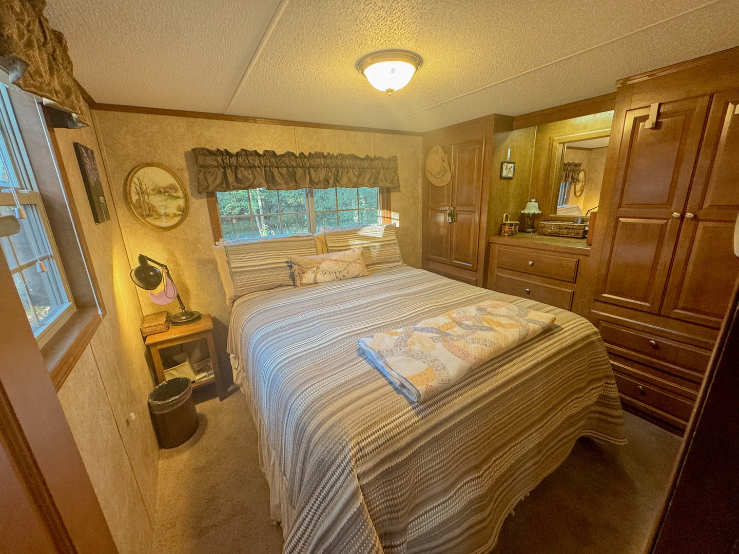 15-185 Woodhaven Sublette, IL 61367 - Photo 16 of 22 a bedroom with a bed and wooden floor