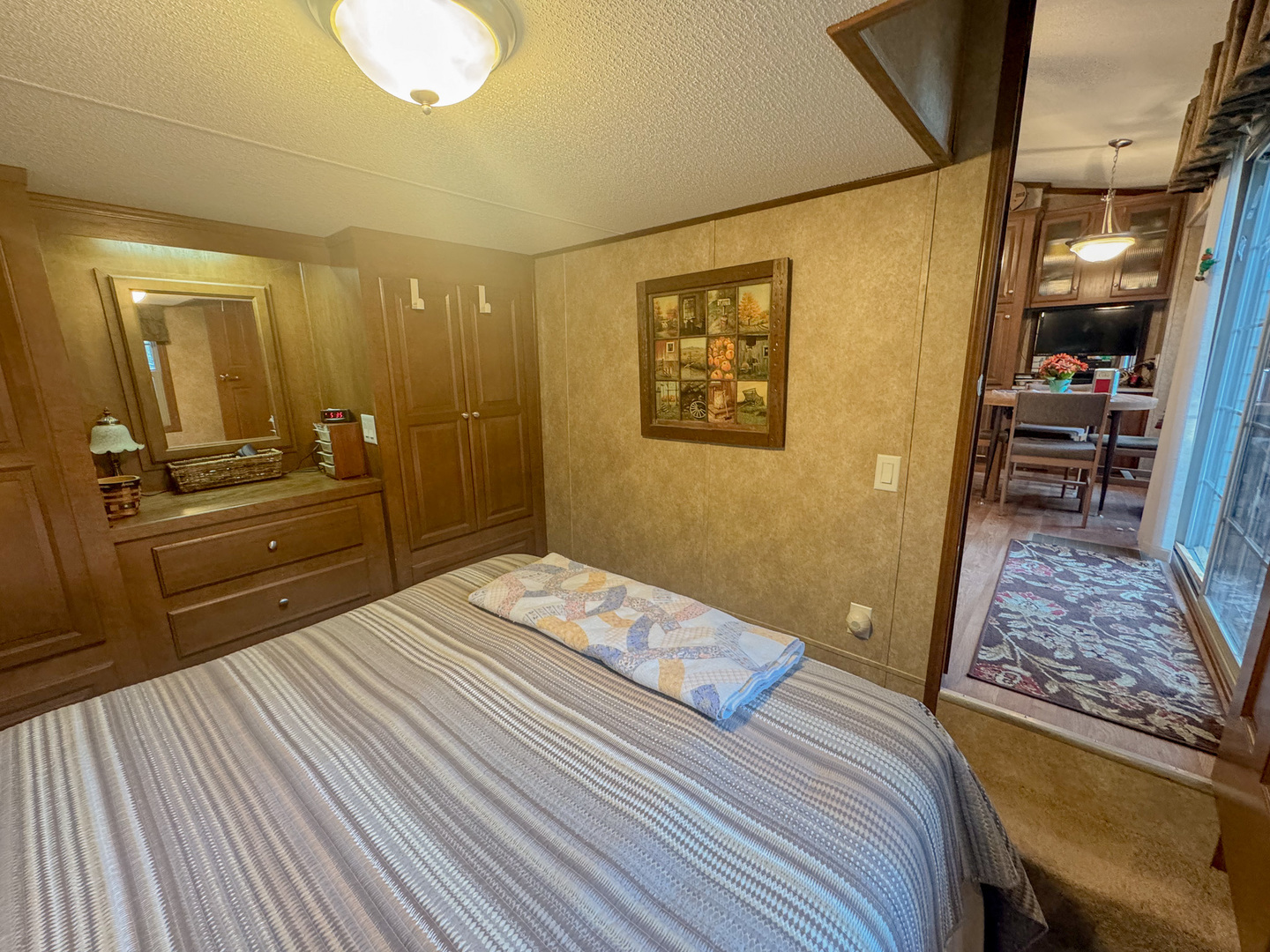 15-185 Woodhaven Sublette, IL 61367 - Photo 18 of 22 a bedroom with a bed and a walk in closet