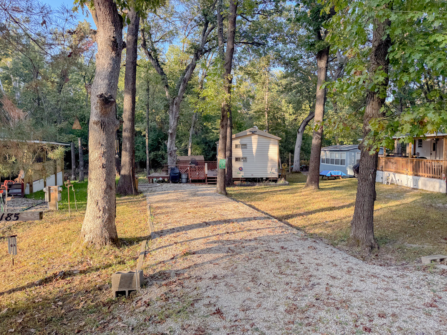 15-185 Woodhaven Sublette, IL 61367 - Photo 2 of 22 a house with trees in front of it