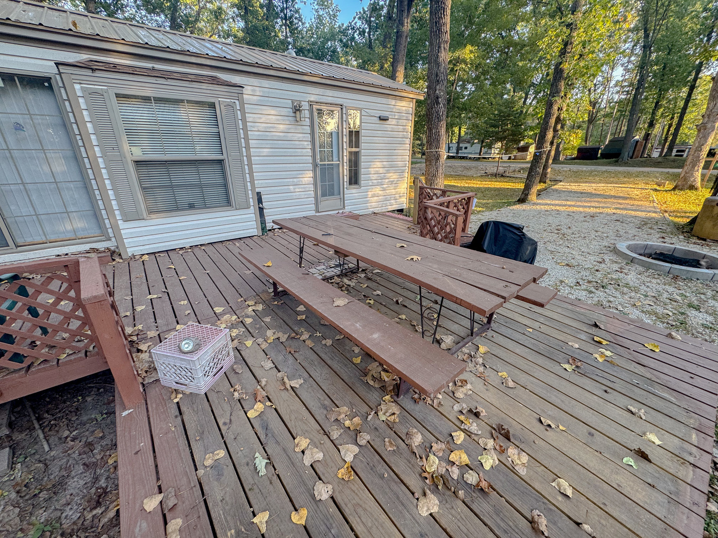15-185 Woodhaven Sublette, IL 61367 - Photo 4 of 22 a view of a wooden deck with a bench
