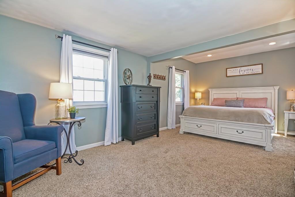 8 Edith Road Hudson, MA 01749 - Photo 12 of 26 a bedroom with furniture and a window