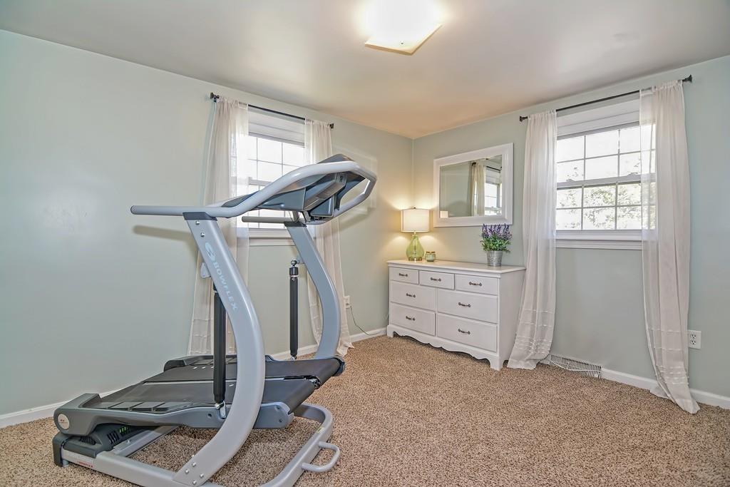 8 Edith Road Hudson, MA 01749 - Photo 16 of 26 a view of a room with gym equipment