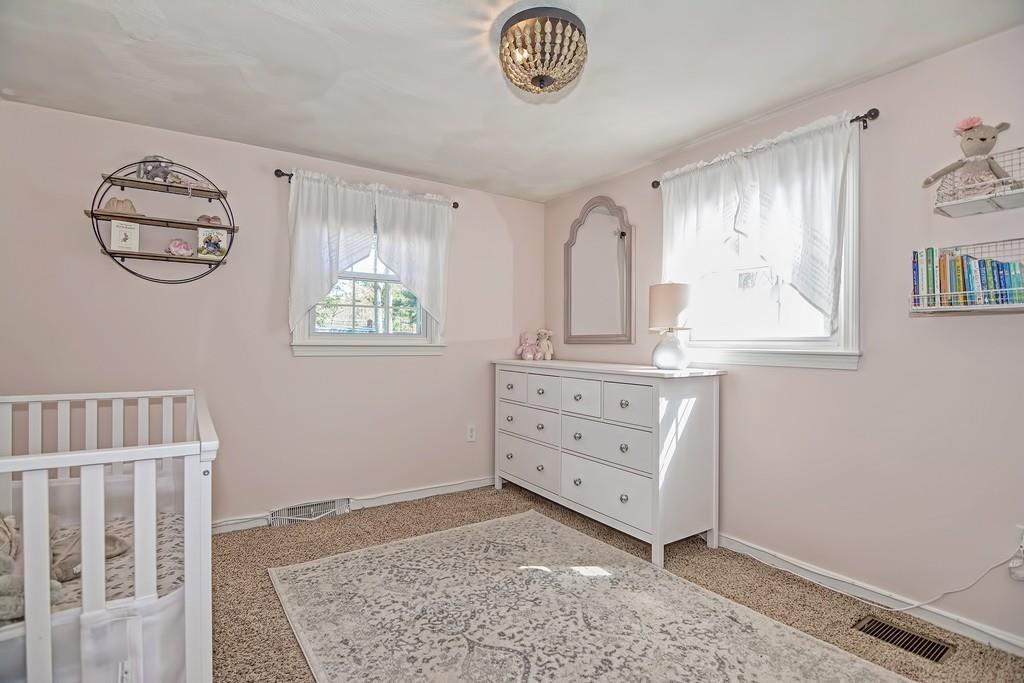 8 Edith Road Hudson, MA 01749 - Photo 19 of 26 walk in closet with window and a kitchen view