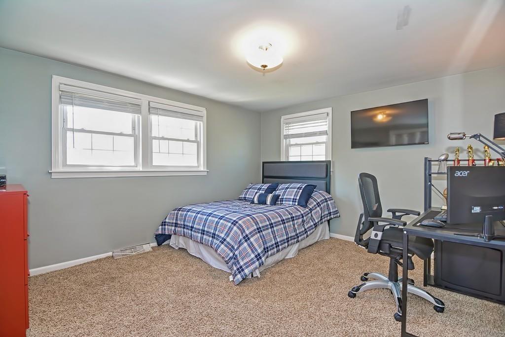 8 Edith Road Hudson, MA 01749 - Photo 23 of 26 a bedroom with a workspace