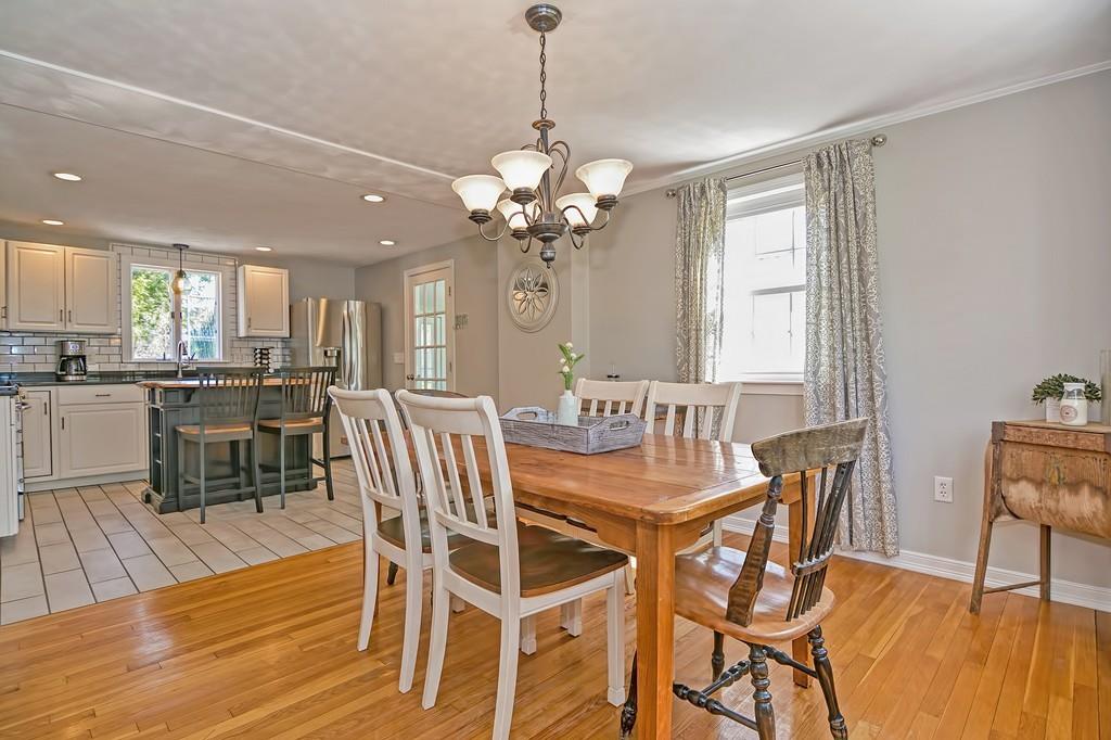 8 Edith Road Hudson, MA 01749 - Photo 8 of 26 a view of a dining room with furniture and wooden floor