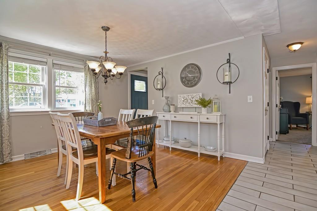 8 Edith Road Hudson, MA 01749 - Photo 9 of 26 a view of a dining room with furniture window and wooden floor