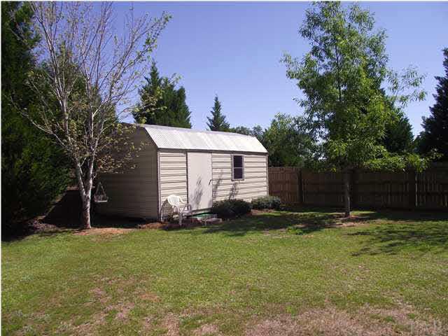 3013 Bud Diamond Road Jay, FL 32565 - Photo 10 of 21 a backyard of a house with lots of green space