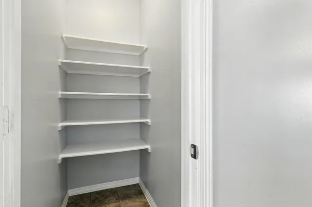 a view of an empty walk in closet