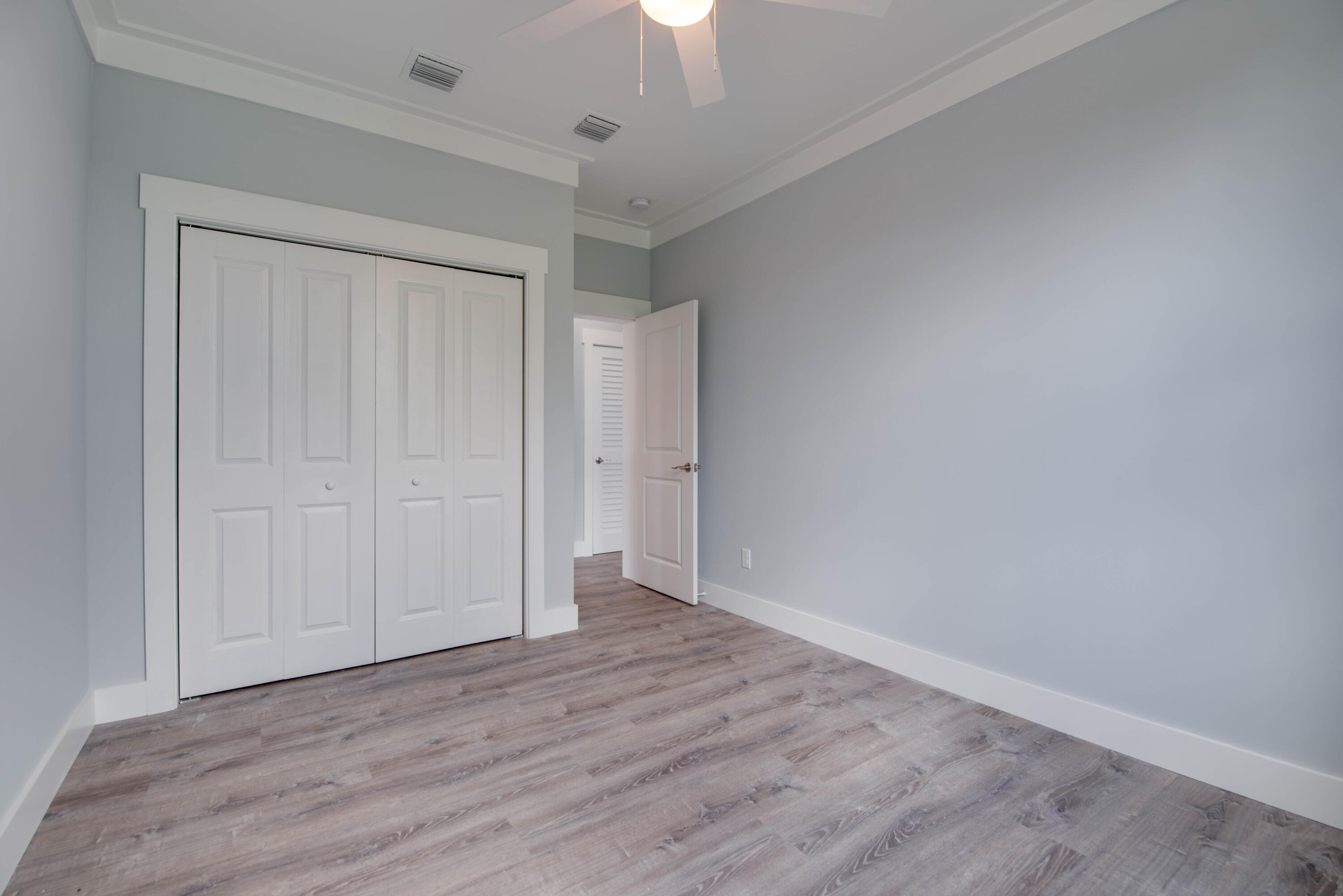 325 Pirates Road Summerland Key, FL 33042 - Photo 11 of 19 wooden floor in an empty room