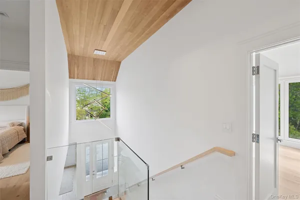a view of entryway with stairs and a window