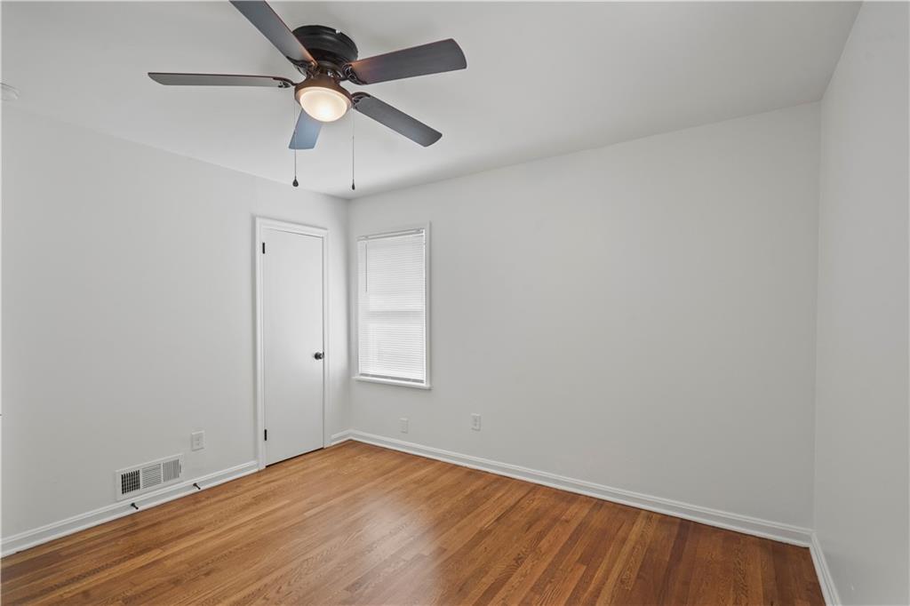 134 Normandy Drive Southwest Marietta, GA 30064 - Photo 23 of 26 wooden floor in an empty room