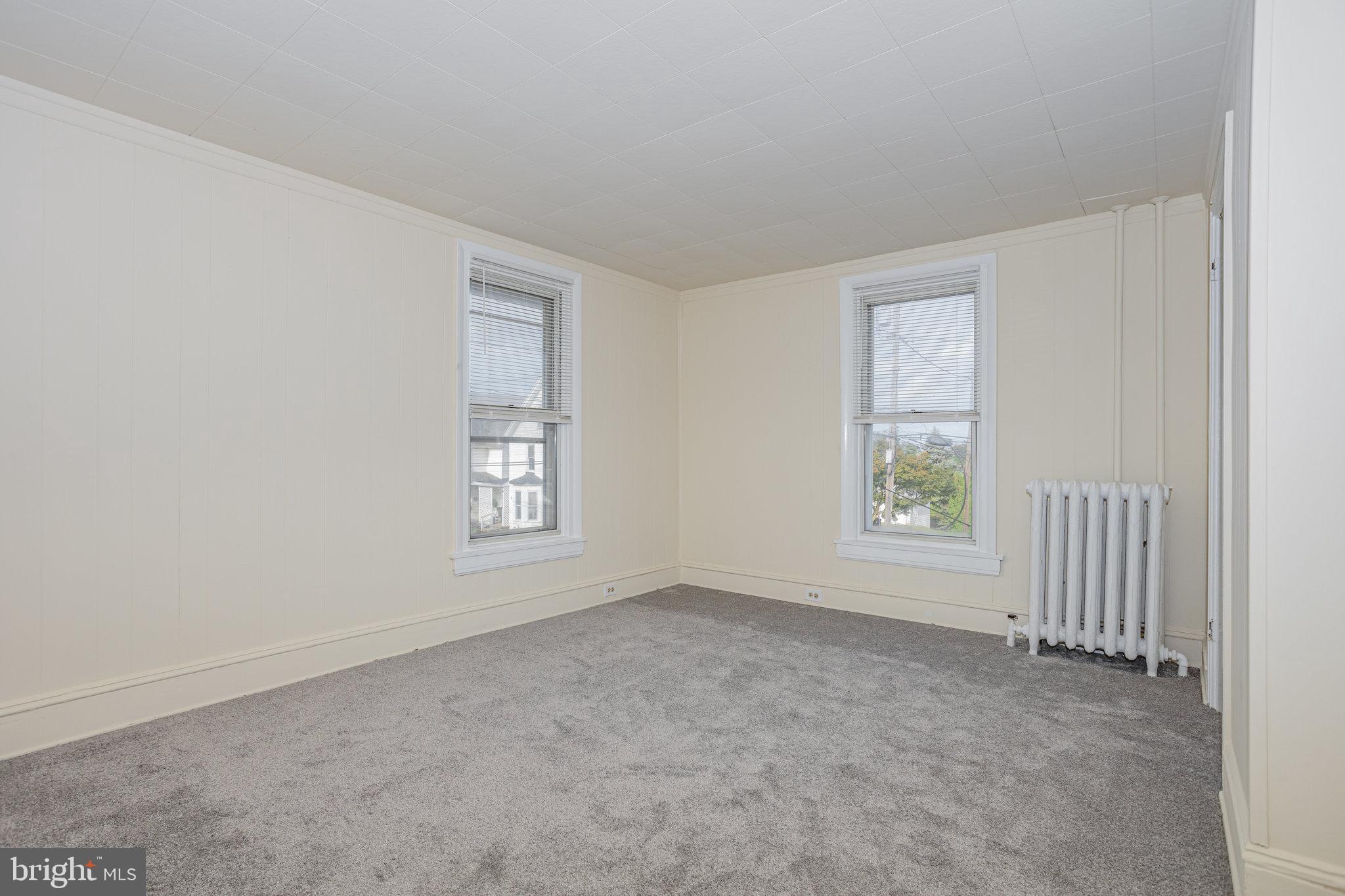 402 Spruce Street Steelton, PA 17113 - Photo 15 of 32 an empty room with windows