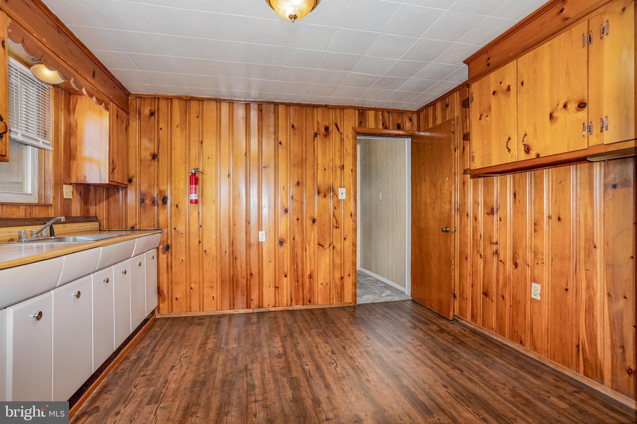 402 Spruce Street Steelton, PA 17113 - Photo 17 of 32 a view of hallway with wooden floor and fan
