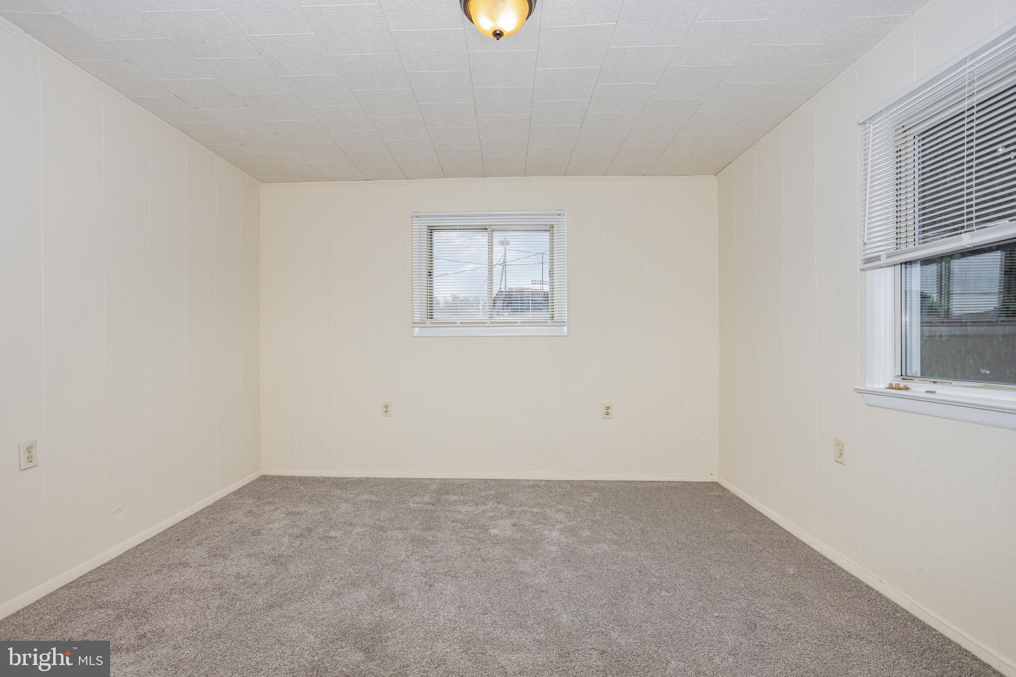 402 Spruce Street Steelton, PA 17113 - Photo 18 of 32 an empty room with windows