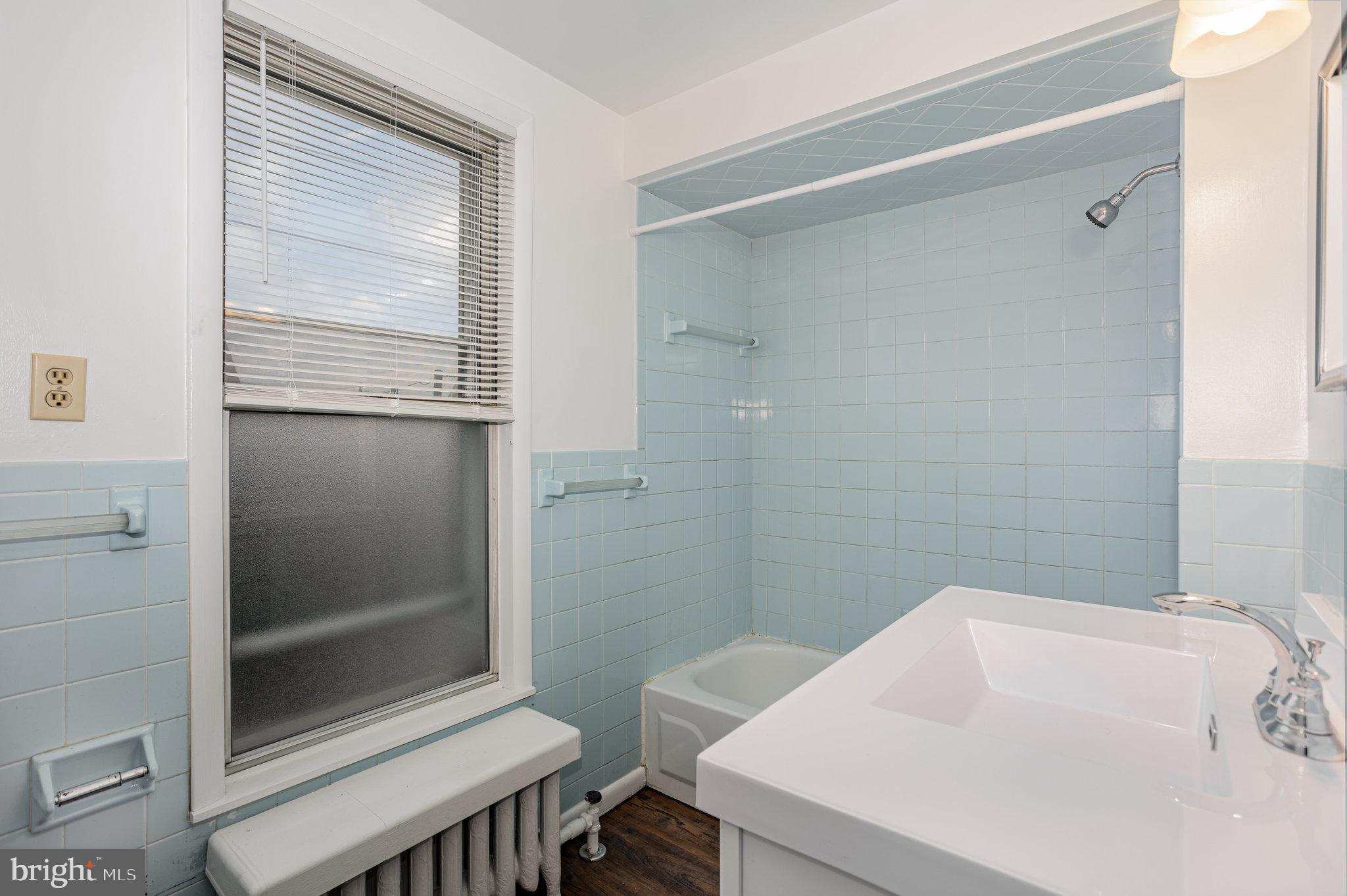 402 Spruce Street Steelton, PA 17113 - Photo 20 of 32 a bathroom with a bathtub and shower