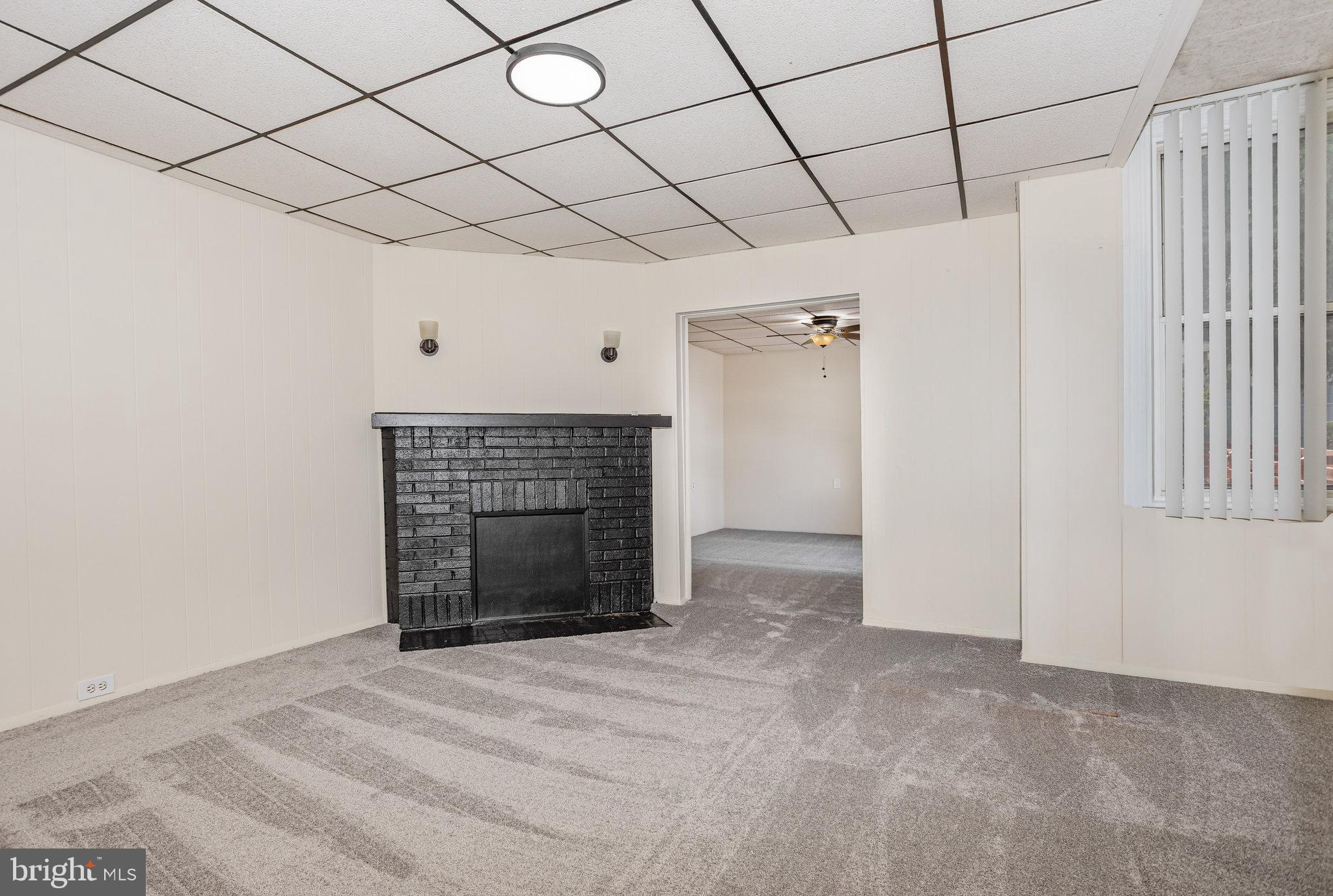 402 Spruce Street Steelton, PA 17113 - Photo 6 of 32 a view of empty room with a fireplace