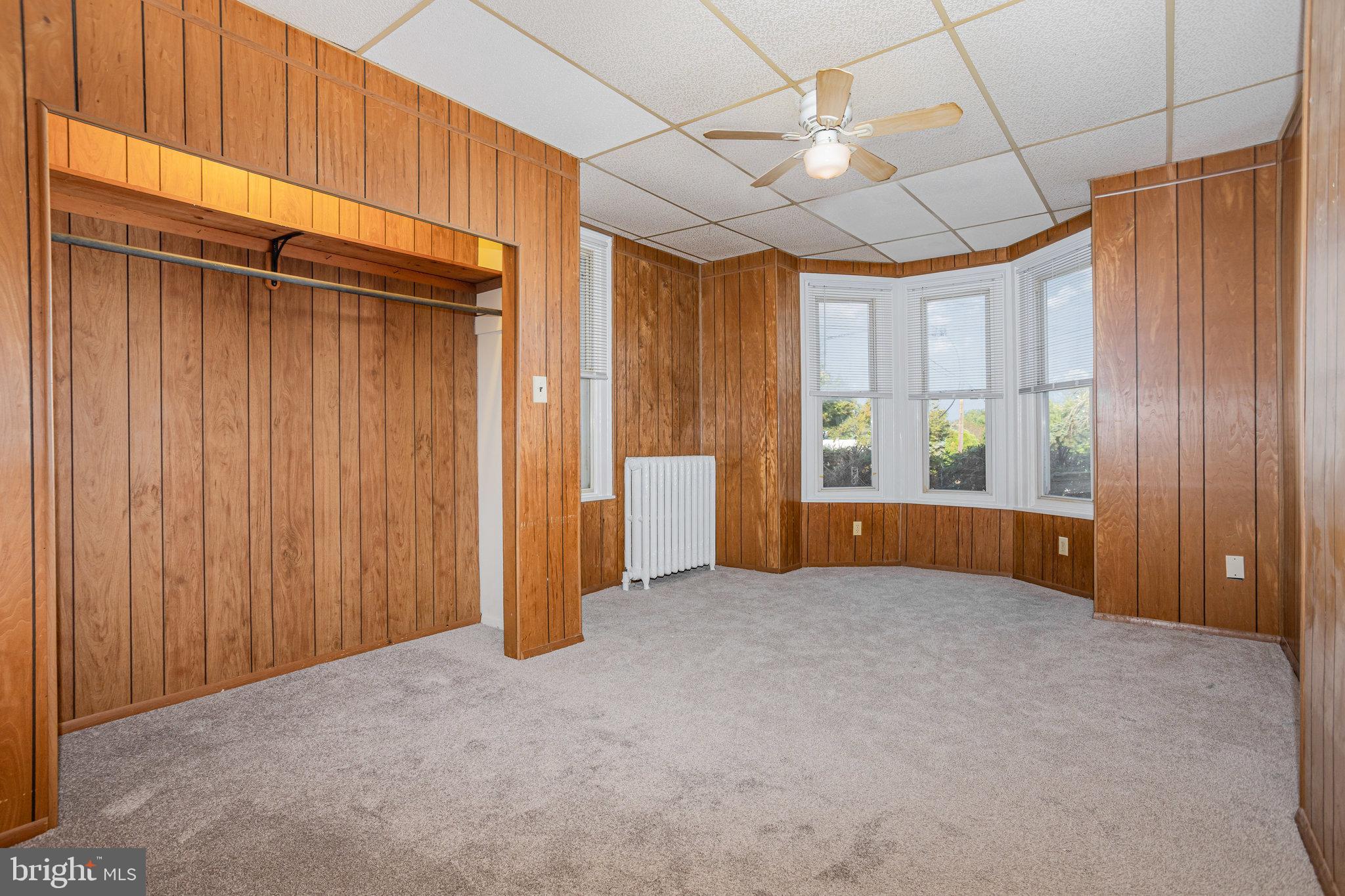 402 Spruce Street Steelton, PA 17113 - Photo 9 of 32 an empty room with windows