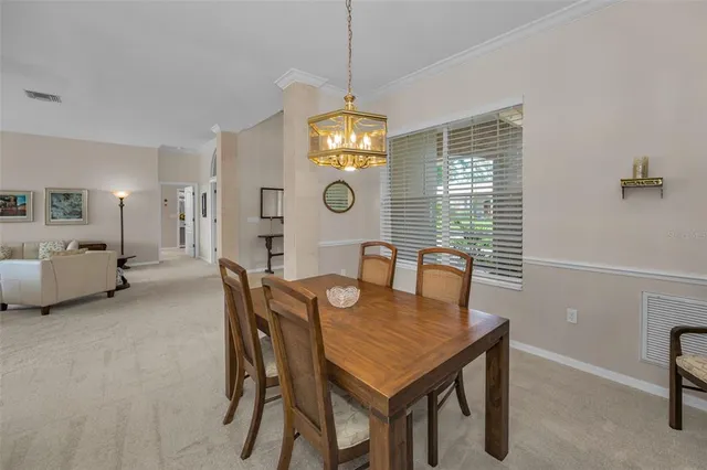 a kitchen with granite countertop a sink a counter top space appliances and cabinets