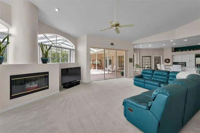 a bedroom with furniture and a flat screen tv