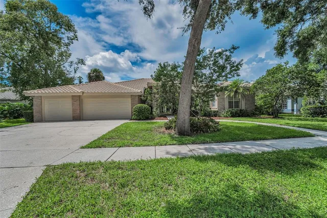 a view of a patio with a dining table and chairs with a fire pit