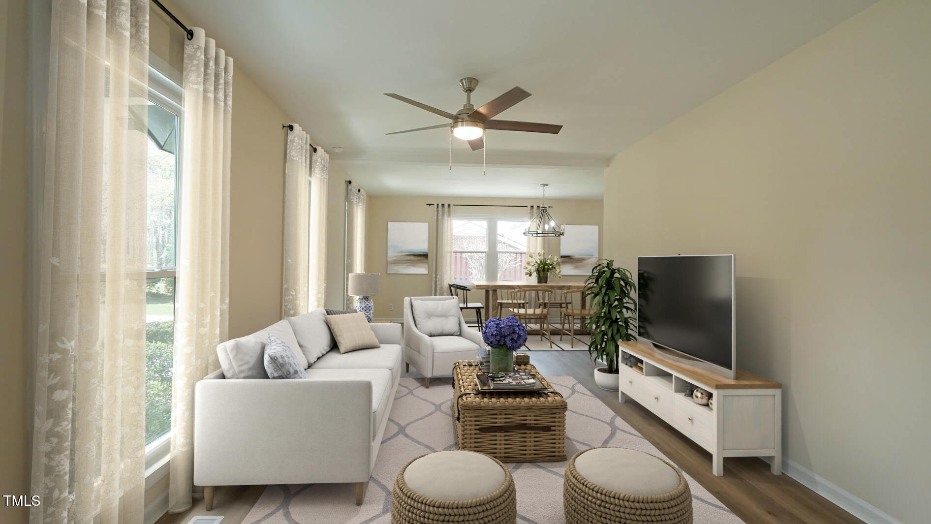 909 Windcrest Road Durham, NC 27713 - Photo 2 of 55 Staged photo of living room and dining r