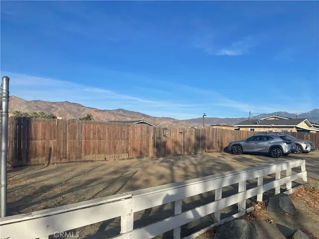 a view of a balcony with an outdoor space