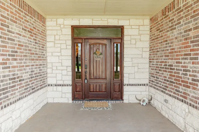 a view of front door of house with an entryway