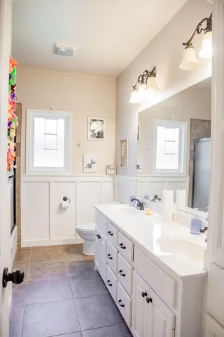 a white refrigerator freezer sitting inside of a kitchen