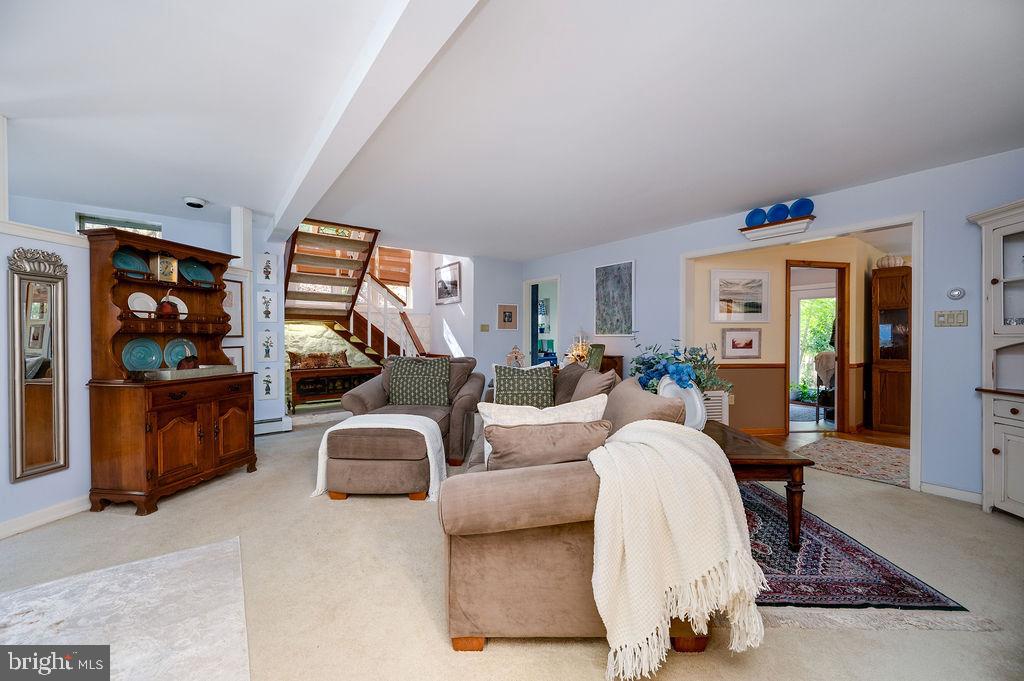 199 Deer Hill Lane Reading, PA 19607 - Photo 12 of 65 a living room with furniture a rug and wall painting