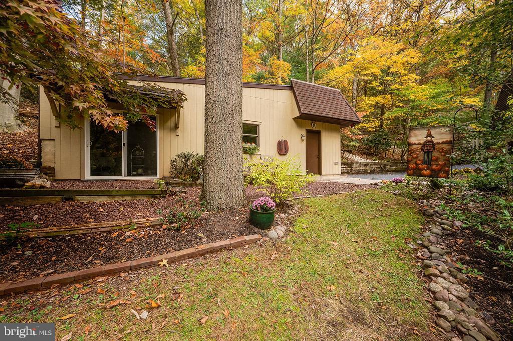 199 Deer Hill Lane Reading, PA 19607 - Photo 55 of 65 a front view of a house with a yard