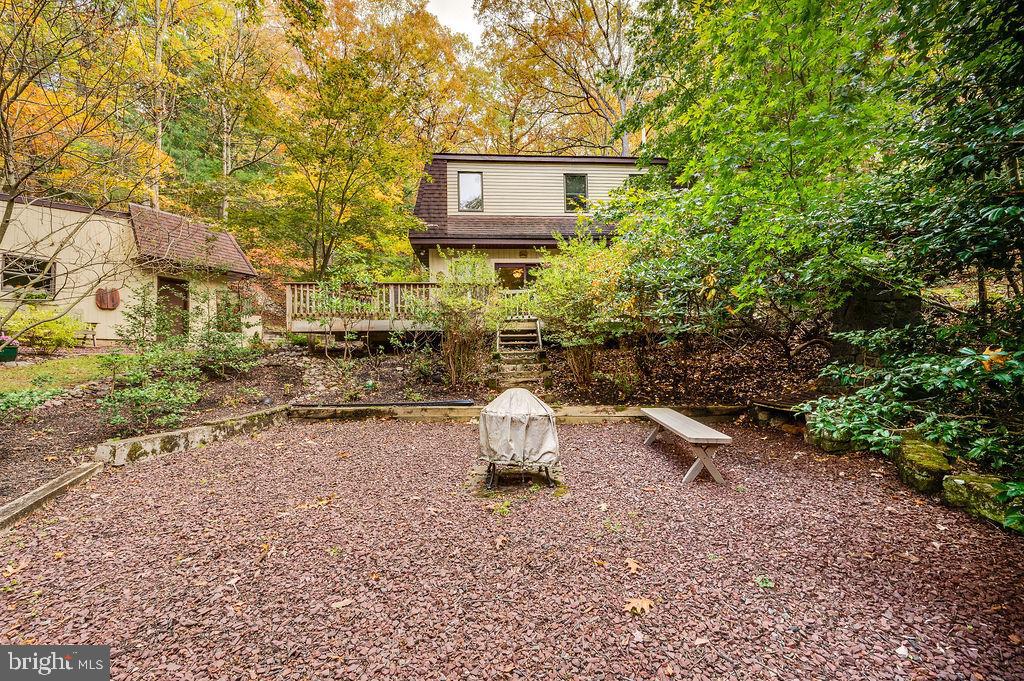 199 Deer Hill Lane Reading, PA 19607 - Photo 57 of 65 a backyard of a house with table and chairs