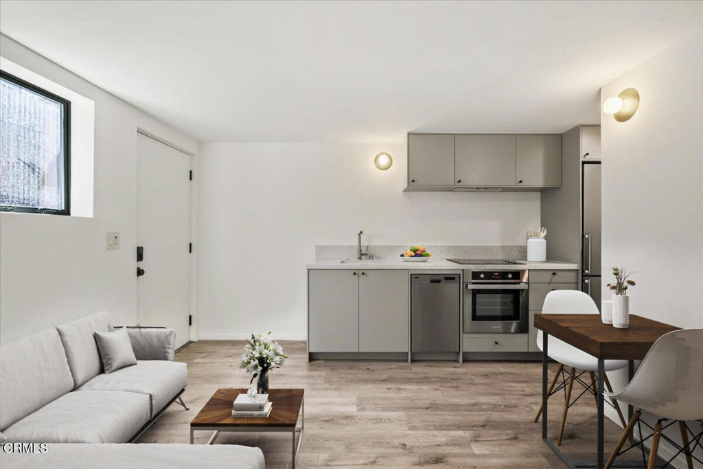 3181 Verdugo Place, Unit 3183 5 Los Angeles, CA 90065 - Photo 3 of 15 a living room with furniture and kitchen