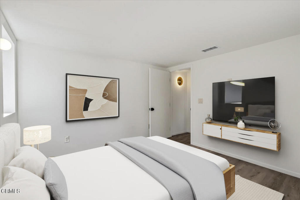 3181 Verdugo Place, Unit 3183 5 Los Angeles, CA 90065 - Photo 8 of 15 a bedroom with a bed and tv
