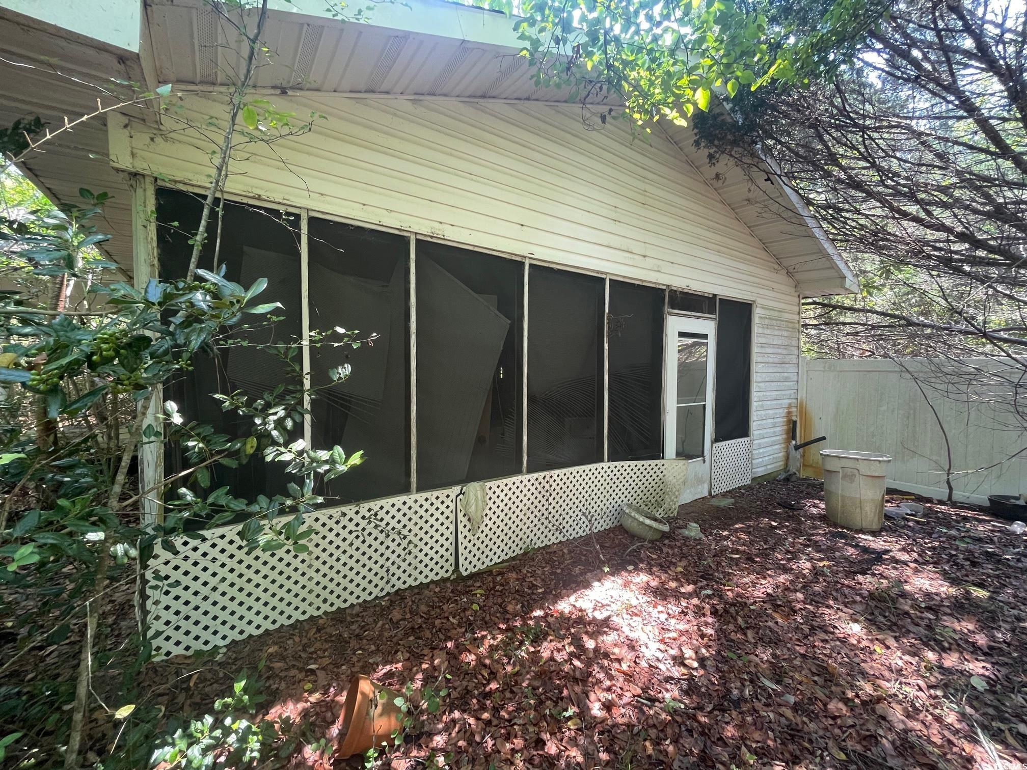 5650 Oak Grove Church Road Nichols, SC 29581 - Photo 2 of 8 View of side of property with a sunroom