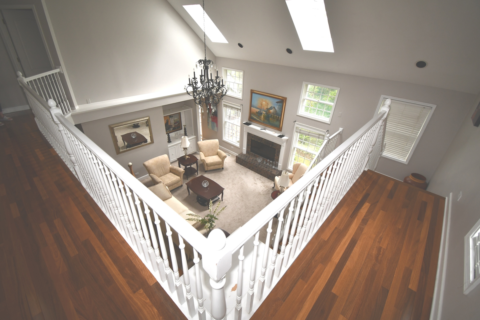 2174 Brookside Lane Aurora, IL 60502 - Photo 15 of 32 a view of a livingroom with wooden floor and stairs