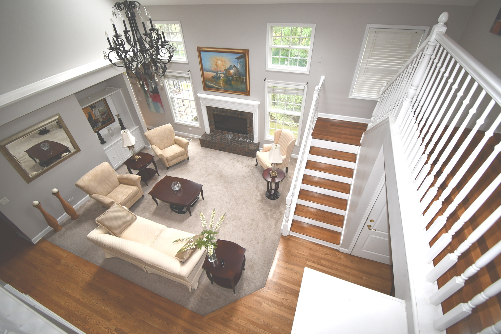 2174 Brookside Lane Aurora, IL 60502 - Photo 19 of 32 a living room with furniture and a fireplace